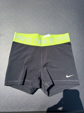 Nike Black Athletic Compression Shorts with Neon Yellow Waistband